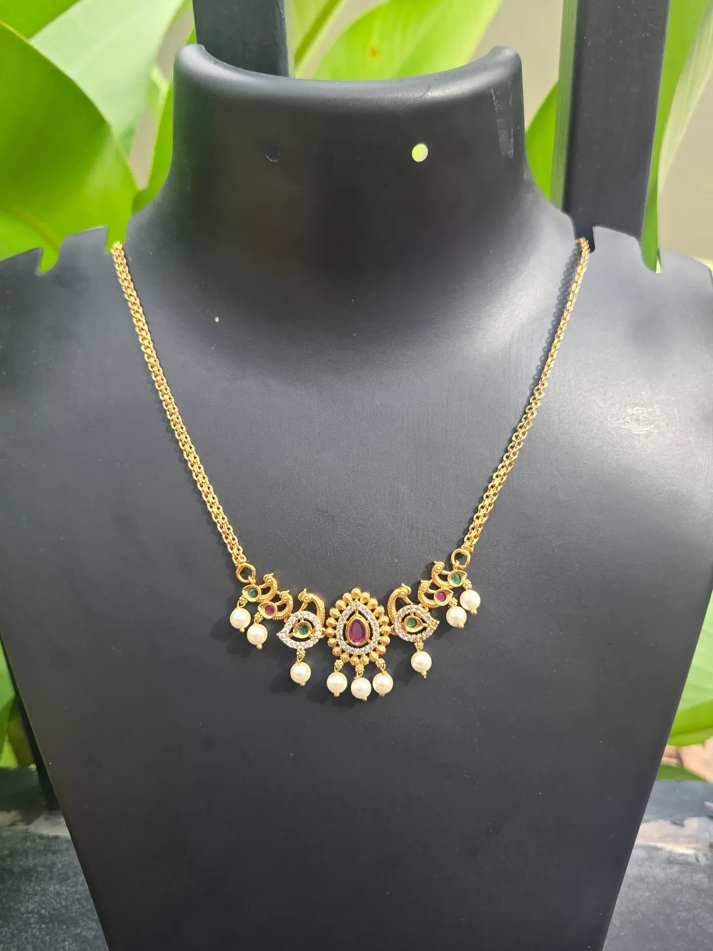 Pearl and stone necklace